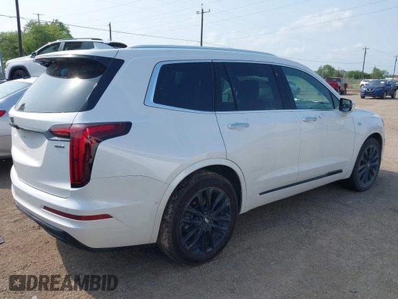 2022 Cadillac XT6 Premium Luxury with VIN 1GYKPCRS2NZ127050, listed as a IAAI auction lot 42072418 with 31,165 mi miles and . Bid and sale history available at DreamBid. Image 4.