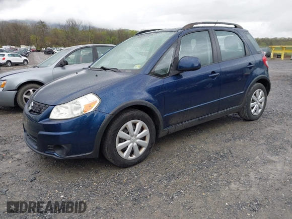 2011 Suzuki SX4 Crossover with VIN JS2YB5A31B6304110, listed as a IAAI auction lot 42023959 with 127,730 mi miles. Bid and sale history available at carsss.com. Image 2.