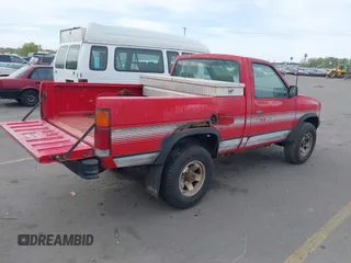 1992 Nissan Frontier XE with VIN 1N6SD11Y3NC326014, listed as a IAAI auction lot 42115936 with 196,493 mi miles and . Bid and sale history available at DreamBid. Image 4.