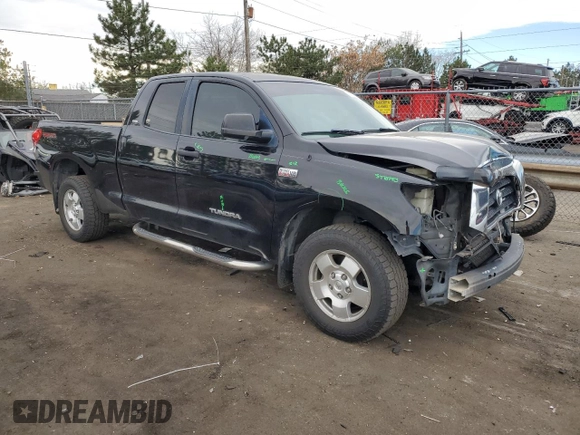 2009 Toyota Tundra 4WD Truck with VIN 5TFBW54139X091759, listed as a Copart auction lot 81697254 with 142,707 mi miles and Salvage Title. Bid and sale history available at carsss.com. Image 4.