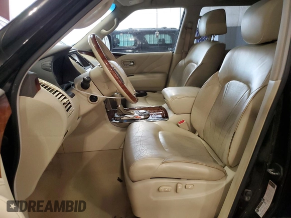 2015 Infiniti QX80 with VIN JN8AZ2NF2F9571484, listed as a Copart auction lot 64143665 with 179,746 mi miles and Salvage title. Bid and sale history available at DreamBid. Image 7.