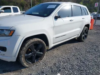 2015 Jeep Grand Cherokee Altitude with VIN 1C4RJFAG1FC797157, listed as a IAAI auction lot 42021139 with 148,491 mi miles. Bid and sale history available at carsss.com. Image 6.