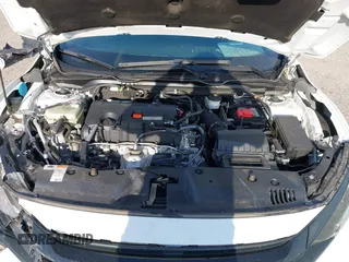 2020 Honda Civic LX with VIN 19XFC2F62LE212421, listed as a IAAI auction lot 41909995 with 46,312 mi miles and . Bid and sale history available at DreamBid. Image 10.