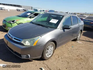 2009 Ford Focus SE with VIN 1FAHP35N79W166875, listed as a IAAI auction lot 41506700 with 174,061 mi miles. Bid and sale history available at carsss.com. Image 2.