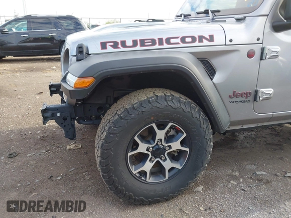 2021 Jeep Wrangler Unlimited Rubicon with VIN 1C4HJXFNXMW560512, listed as a IAAI auction lot 42124812 with 18,034 mi miles and . Bid and sale history available at DreamBid. Image 6.