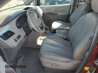 2012 Toyota Sienna XLE AAS z VIN 5TDYK3DC4CS242651, wystawiony jako Copart lot #53980615 z przebiegiem 170 805 mil mil oraz Szkoda całkowita • Salvage title. Historia ofert i sprzedaży dostępna na DreamBid. Obrazek 7.