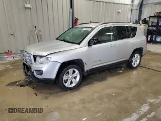 2011 Jeep Compass with VIN 1J4NT1FB0BD245673, listed as a Copart auction lot 82597074 with 207,695 mi miles and Clean Title. Bid and sale history available at carsss.com. Image 1.