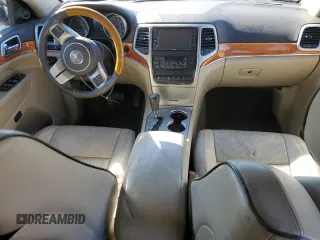 2013 Jeep Grand Cherokee Overland with VIN 1C4RJECG1DC525986, listed as a Copart auction lot 42040775 with 148,784 mi miles and Salvage Title. Bid and sale history available at carsss.com. Image 8.