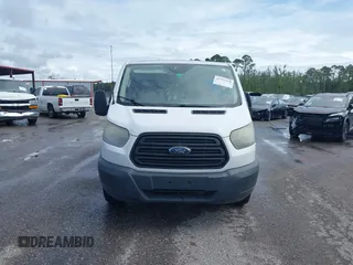 2016 Ford Transit Cargo with VIN 1FTYE1YMXGKB08593, listed as a IAAI auction lot 42347910 with 206,109 mi miles and . Bid and sale history available at DreamBid. Image 12.