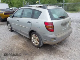 2004 Pontiac Vibe with VIN 5Y2SL62864Z465907, listed as a IAAI auction lot 42102597 with 164,548 mi miles. Bid and sale history available at carsss.com. Image 3.