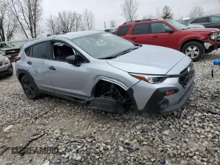 2024 Subaru Crosstrek z VIN JF2GUABC9R8887498, wystawiony jako Copart lot #52479215 z przebiegiem 988 mil mil oraz Szkoda całkowita • Salvage title. Historia ofert i sprzedaży dostępna na DreamBid. Obrazek 4.