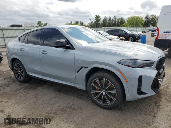 2025 BMW X6 M60i with VIN 5UX43EX06S9W68023, listed as a Copart auction lot 69874764 with 3,789 mi miles and Salvage Title. Bid and sale history available at carsss.com. Image 4.