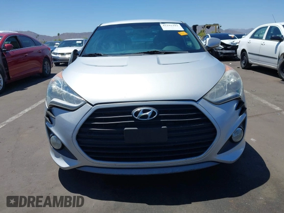 2013 Hyundai Veloster Turbo z VIN KMHTC6AE0DU177983, wystawiony jako IAAI lot #42292102 z przebiegiem 121 142 mil mil oraz . Historia ofert i sprzedaży dostępna na DreamBid. Obrazek 12.