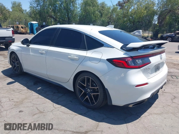 2022 Honda Civic Sport Touring z VIN 19XFL1G82NE000678, wystawiony jako IAAI lot #42221847 z przebiegiem 90 869 mil mil oraz . Historia ofert i sprzedaży dostępna na DreamBid. Obrazek 3.
