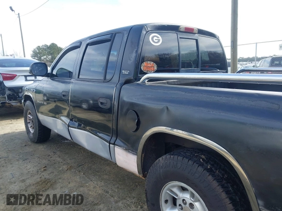 2000 Dodge Dakota Sport with VIN 1B7GL2AX8YS790208, listed as a IAAI auction lot 41613640 with 365,198 mi miles and . Bid and sale history available at DreamBid. Image 18.
