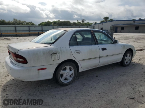 1995 Mitsubishi Galant ES with VIN 4A3AJ56G4SE193873, listed as a Copart auction lot 71312154 with 57,695 mi miles and Clean Title. Bid and sale history available at carsss.com. Image 3.
