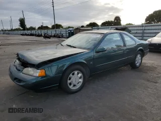 1994 Ford Thunderbird LX with VIN 1FALP62W6RH128762, listed as a Copart auction lot 84306604 with 68,314 mi miles and Salvage Title. Bid and sale history available at DreamBid. Image 1.