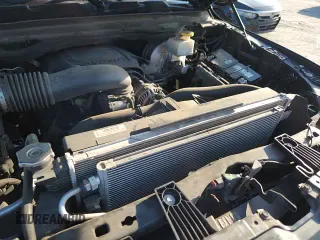 2020 Ram 1500 Rebel z VIN 1C6SRFLT0LN357023, wystawiony jako Copart lot #69025675 z przebiegiem 114 804 mil mil oraz Szkoda całkowita • Salvage title. Historia ofert i sprzedaży dostępna na DreamBid. Obrazek 14.