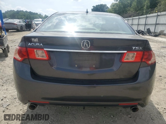 2012 Acura TSX z VIN JH4CU2F4XCC007997, wystawiony jako Copart lot #59993885 z przebiegiem 124 287 mil mil oraz Szkoda całkowita • Salvage title. Historia ofert i sprzedaży dostępna na DreamBid. Obrazek 6.