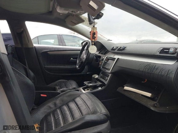 2009 Volkswagen CC VR6 Sport with VIN WVWEU73C99E557501, listed as a IAAI auction lot 41842303 with 203,114 mi miles. Bid and sale history available at carsss.com. Image 5.