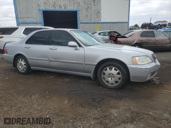 2004 Acura RL w/Navigation System z VIN JH4KA966X4C006574, wystawiony jako Copart lot #52045205 z przebiegiem 123 767 mil mil oraz Czysty tytuł • Clean title. Historia ofert i sprzedaży dostępna na DreamBid. Obrazek 4.