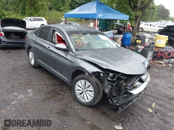 2019 Volkswagen Jetta S z VIN 3VWC57BU7KM232096, wystawiony jako IAAI lot #42317927 z przebiegiem 98 615 mil mil oraz . Historia ofert i sprzedaży dostępna na DreamBid. Obrazek 1.