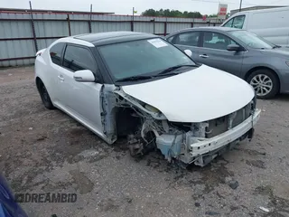 2013 Scion tC z VIN JTKJF5C70D3058888, wystawiony jako IAAI lot #41892224 z przebiegiem 84 749 mil mil oraz . Historia ofert i sprzedaży dostępna na DreamBid. Obrazek 1.