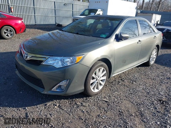 2014 Toyota Camry L with VIN 4T4BF1FK6ER393445, listed as a IAAI auction lot 42044946 with 130,169 mi miles. Bid and sale history available at carsss.com. Image 2.