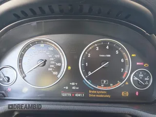 2015 BMW X3 xDrive28i with VIN 5UXWX9C53F0D53909, listed as a IAAI auction lot 41935051 with 122,775 mi miles and . Bid and sale history available at DreamBid. Image 7.