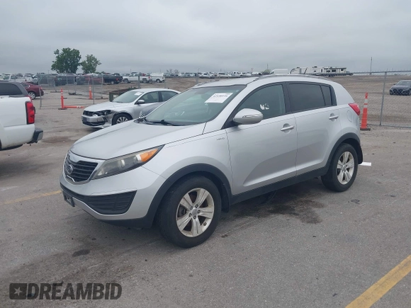2012 Kia Sportage LX with VIN KNDPBCA24C7214432, listed as a IAAI auction lot 42530116 with 127,623 mi miles and . Bid and sale history available at DreamBid. Image 2.