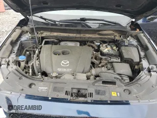 2017 Mazda CX-5 Grand Touring with VIN JM3KFADL3H0125143, listed as a Copart auction lot 50178005 with 160,058 mi miles and Salvage Title. Bid and sale history available at carsss.com. Image 14.