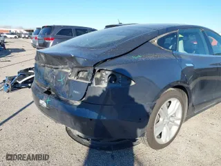 2016 Tesla Model S 90D with VIN 5YJSA1E20GF128496, listed as a IAAI auction lot 41214785 with 126,671 mi miles. Bid and sale history available at carsss.com. Image 6.