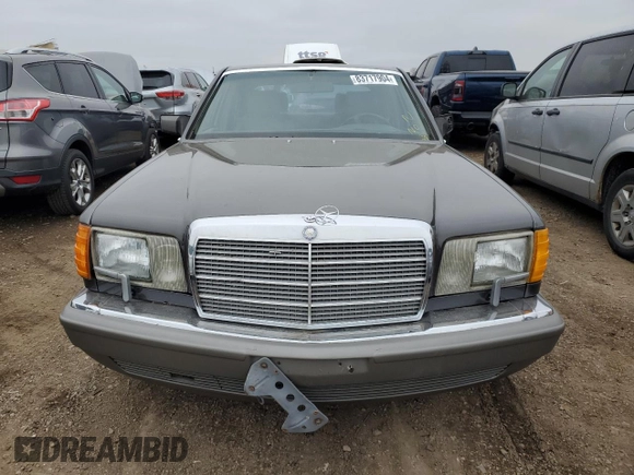 1987 Mercedes-Benz 560 with VIN WDBCA39D7HA322057, listed as a Copart auction lot 83717904 with 246,060 mi miles and Clean Title. Bid and sale history available at DreamBid. Image 5.
