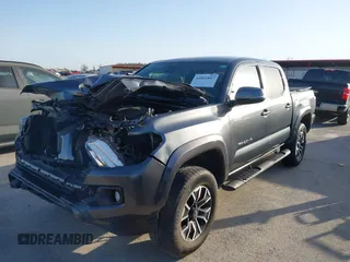 2023 Toyota Tacoma 4WD SR with VIN 3TMCZ5AN7PM587833, listed as a IAAI auction lot 41853887 with 16,532 mi miles. Bid and sale history available at carsss.com. Image 2.