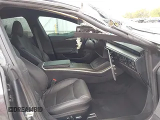 2021 Tesla Model S Plaid z VIN 5YJSA1E6XMF429436, wystawiony jako IAAI lot #41826114 z przebiegiem Nie podano mil oraz . Historia ofert i sprzedaży dostępna na DreamBid. Obrazek 5.