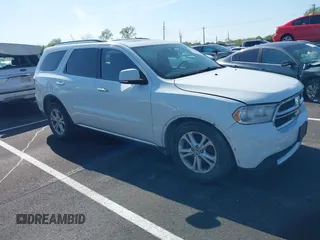2013 Dodge Durango Crew with VIN 1C4RDJDG0DC670810, listed as a IAAI auction lot 41974024 with 209,379 mi miles and . Bid and sale history available at carsss.com. Image 1.