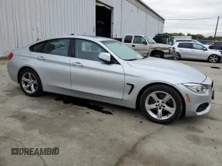 2015 BMW 4 Series 428i xDrive with VIN WBA4C9C5XFG135391, listed as a Copart auction lot 70753653 with 70,870 mi miles and . Bid and sale history available at DreamBid. Image 4.