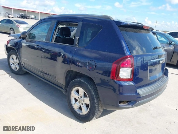 2014 Jeep Compass Sport with VIN 1C4NJCBA8ED594055, listed as a IAAI auction lot 40124452 with 106,067 mi miles. Bid and sale history available at carsss.com. Image 3.