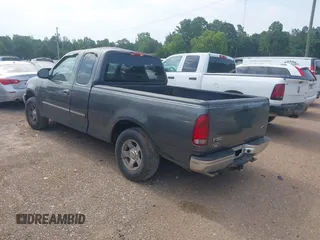 2002 Ford F-150 XL with VIN 1FTRX17W72NA87338, listed as a IAAI auction lot 42583398 with Not provided miles and . Bid and sale history available at DreamBid. Image 3.