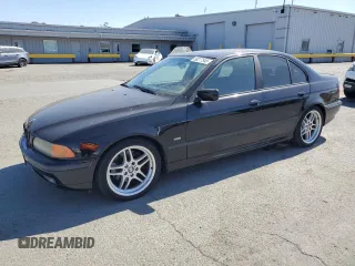 1999 BMW 5 Series 540i z VIN WBADN6341XGM64045, wystawiony jako Copart lot #58277545 z przebiegiem Nie podano mil oraz Czysty tytuł • Clean title. Historia ofert i sprzedaży dostępna na DreamBid. Obrazek 1.