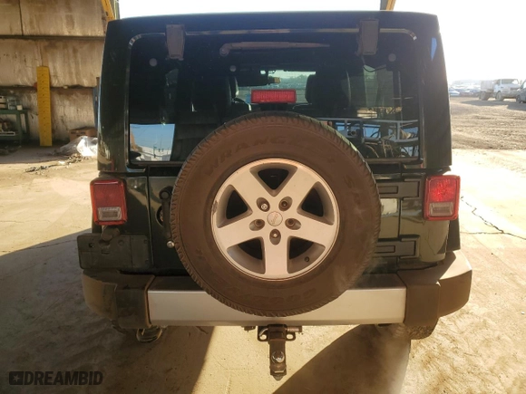 2011 Jeep Wrangler Unlimited Sahara with VIN 1J4BA5H13BL544178, listed as a Copart auction lot 85292354 with 188,892 mi miles and Salvage Title. Bid and sale history available at carsss.com. Image 6.