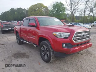 2016 Toyota Tacoma SR with VIN 5TFCZ5AN3GX039094, listed as a IAAI auction lot 42043077 with 216,438 mi miles. Bid and sale history available at carsss.com. Image 1.