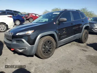 2015 Jeep Cherokee Trailhawk z VIN 1C4PJMBS8FW699319, wystawiony jako Copart lot #61612245 z przebiegiem 173 581 mil mil oraz Czysty tytuł • Clean title. Historia ofert i sprzedaży dostępna na DreamBid. Obrazek 1.