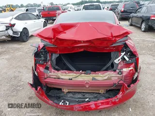 2018 Tesla Model 3 Long Range Battery z VIN 5YJ3E1EB8JF119898, wystawiony jako IAAI lot #42297445 z przebiegiem 29 555 mil mil oraz . Historia ofert i sprzedaży dostępna na DreamBid. Obrazek 16.