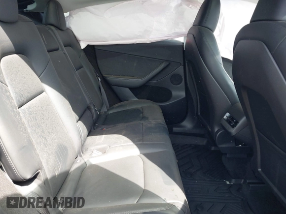 2022 Tesla Model Y Long Range with VIN 7SAYGDEE2NA017434, listed as a IAAI auction lot 41842025 with 35,164 mi miles and . Bid and sale history available at DreamBid. Image 8.