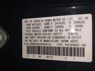 2009 Acura TSX with VIN JH4CU26629C004182, listed as a IAAI auction lot 42086811 with 206,526 mi miles. Bid and sale history available at carsss.com. Image 9.