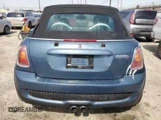 2010 MINI Convertible S with VIN WMWMS3C5XATY51076, listed as a Copart auction lot 48532735 with 104,901 mi miles and Clean title. Bid and sale history available at DreamBid. Image 6.
