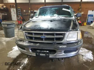 1997 Ford F-150 z VIN 1FTDF18W3VNC15218, wystawiony jako Copart lot #87706315 z przebiegiem 206 418 mil mil oraz Szkoda całkowita • Salvage title. Historia ofert i sprzedaży dostępna na DreamBid. Obrazek 5.