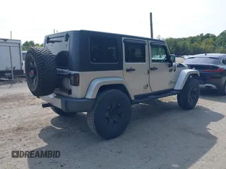 2008 Jeep Wrangler Unlimited Sahara with VIN 1J4GA59158L623784, listed as a IAAI auction lot 40365783 with 185,224 mi miles and . Bid and sale history available at DreamBid. Image 4.