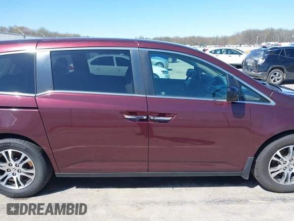 2012 Honda Odyssey EX with VIN 5FNRL5H42CB136915, listed as a IAAI auction lot 41972714 with 211,729 mi miles and . Bid and sale history available at carsss.com. Image 13.